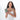 A woman holding a Sherpani Vienna Aloe Mist Green Anti-theft Passport Wallet against a white background.  #color_aloe-mist-green