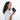 A woman holding a Sherpani Vienna Carbon Black Anti-theft Passport Wallet against a white background.  #color_carbon-black