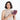 Woman holding a Sherpani Vienna Smoky Orchid Anti-theft Passport Wallet against white background. #color_smoky-orchid-pink