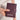 Person holding Sherpani Vienna Smoky Orchid Anti-theft Passport Wallet against white background. #color_smoky-orchid-pink