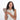 A woman holding a Sherpani Vienna Straw Beige Anti-theft Passport Wallet against a white background.  #color_straw-beige